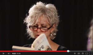Kate DiCamillo reading a book