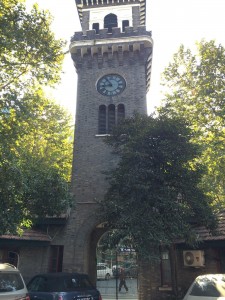 An image of the historic Hangzhou YMCA clock tower and building, constructed in 1919 with assistance from the American YMCA