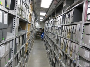 Picture of rows of boxes, filled with archival material in the Tretter Collection.