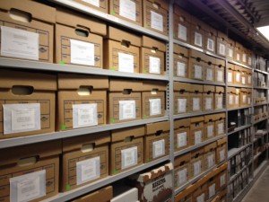 Picture of rows of boxes, filled with archival material in the Tretter Collection.