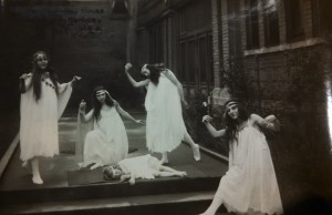 Women dancing on stage in “Sunshine and Shadow” pageant at Neighborhood House in Louisville, Kentucky. Circa 1920.