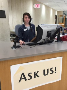 Margaret is ready to check out your books or help you use the library.
