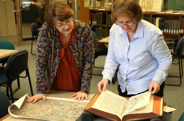 Maggie Ragnow and Lois Hendrickson in Wangensteen Library
