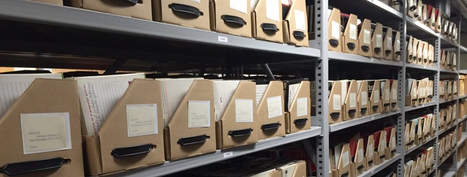 Tape recordings in trays on shelves