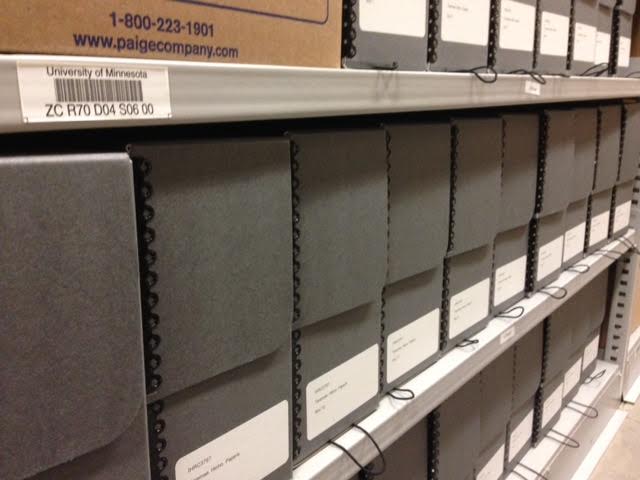 Image of hollinger boxes on shelves.