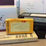 Various formats in the Lutheran Social Services records including VHS video tapes, glass negatives and 3M reel to reel tape