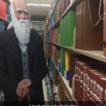 Charles Darwin shelving books