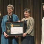 Jennifer Gunn and Wendy Lougee accept the National Medal for Museum and Library Service