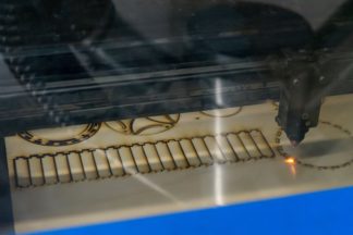 Photo of laser cutter in use.