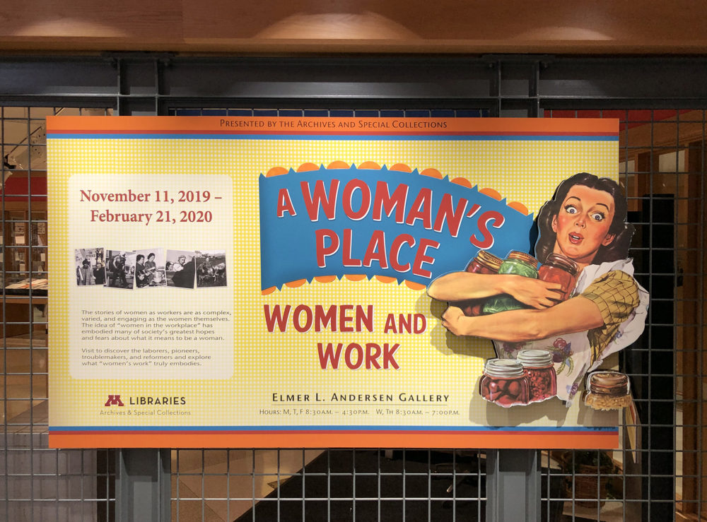 Banner for "Women and Work" exhibit, with woman in an apron holding canned foods