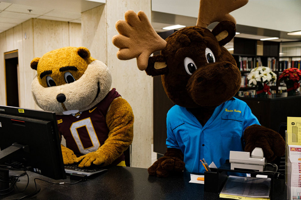 Goldy And Mooster Take Their Shift At The Wilson Library Service