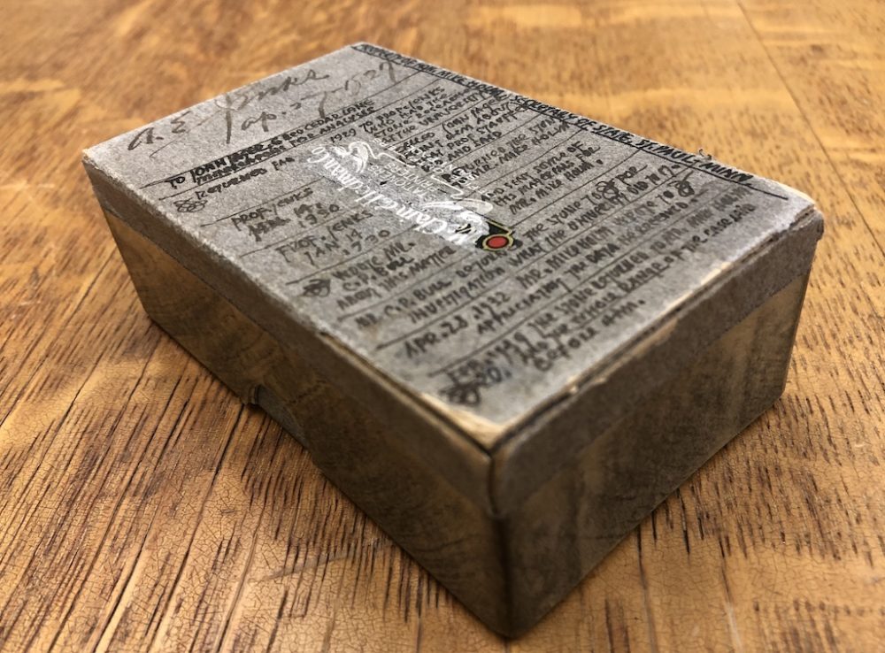 Cardboard box that was used to transport the stone. Handwritten notes on the top of the box detail who had the stone between 1927 and 1939.