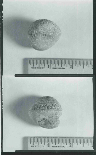 Images of the stone likely taken when it was in Theodore Blegen's possession at the Minnesota Historical Society. Images located at the University of Minnesota Archives.