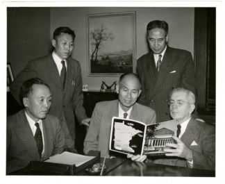 This photograph features Dr. Harold Macy showing a University of Minnesota pamphlet to SNU faculty including, Dr. Park, Ministry of Education, Mr. Lee, Professor of the College of Agriculture, Dr. Choi, President of SNU, and Mr. Kim, Principal of Seoul High School. Source: University of Minnesota Archives, Photograph Collection.