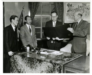 This photograph features Joong Whi Kwon, Dean of Students, Chong Soo Lee, Academic Dean and Vice President Il Sun Yun receiving greetings from. Dr. A. E. Schneider, of the University of Minnesota and Chief Adviser in Korea for the SNU cooperative project, in 1955. Source: University of Minnesota Archives, Arthur E. Schneider Papers (uarc 1142): Photographs (Box 1, Folder 7).