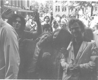 Students linking arms during a rally in May of 1970. Bill Tilton papers, University Archives, University of Minnesota, Twin Cities.