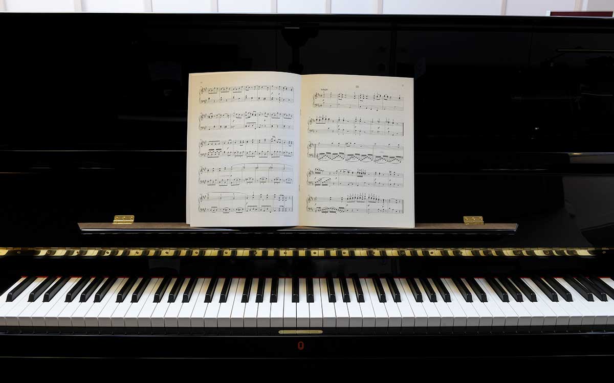 Piano with classical music score