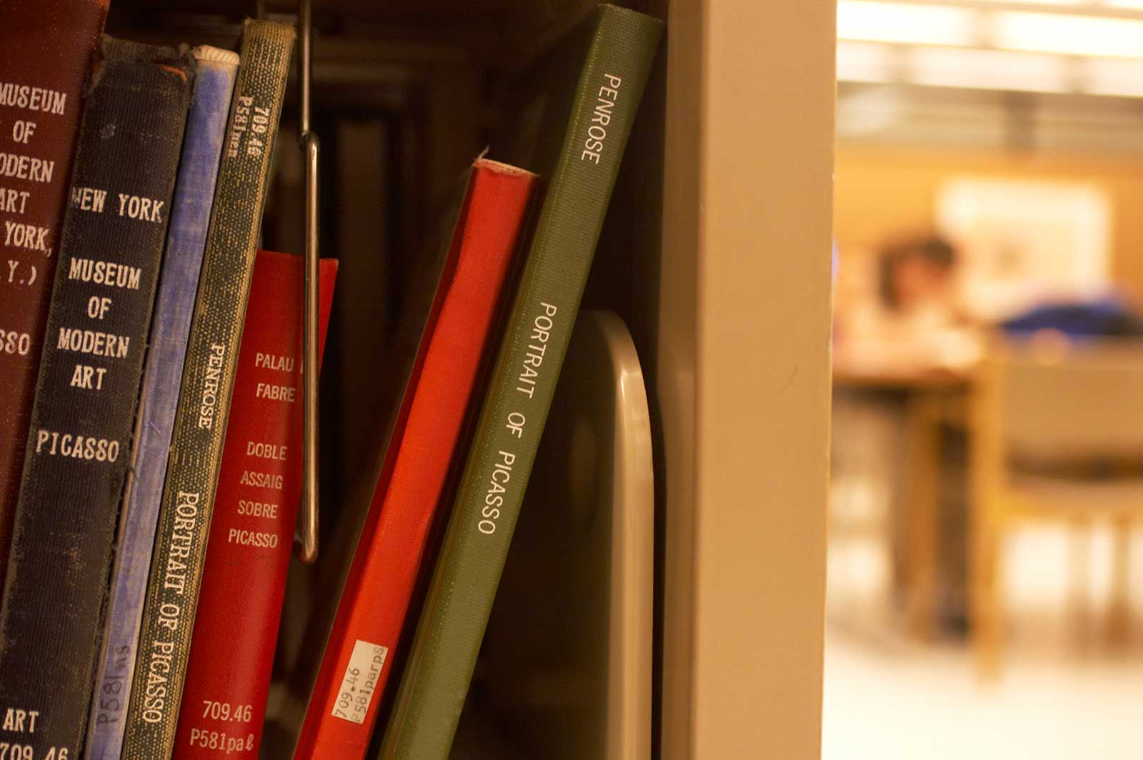 Books on the stacks in Wilson Library
