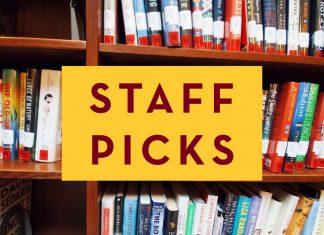 A bookshelf at Walter Library with overlaid text that reads "Staff Picks"