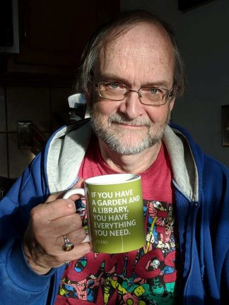 Stephen Hearn with a mug