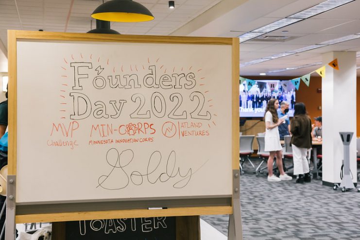 a whiteboard in the Toaster with hand-lettered text that reads, Founders Day 2022