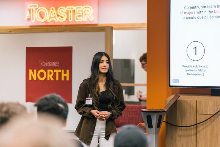 a student entrepreneur gives a presentation at the Toaster