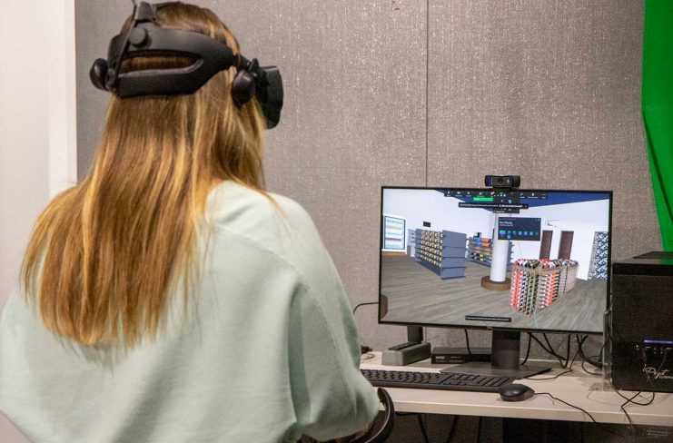 A design student working on their retail project in the Libraries' VR Studio.