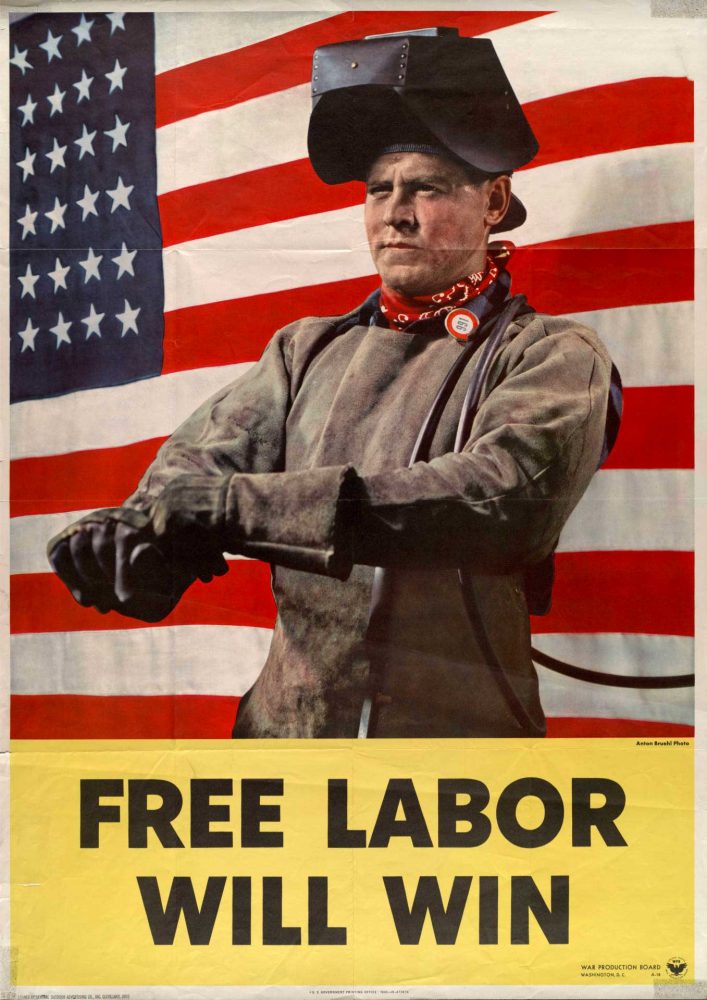 A welder wearing a face mask, protective work clothing and gloves stands proudly against a backdrop of a large U.S. flag, in this WWII-era poster.