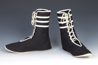 Black and white lace-up boots from the Goldstein Museum