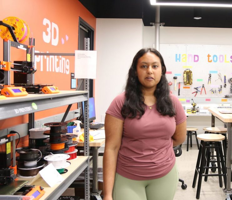 Sara, a student, in the Makerspace