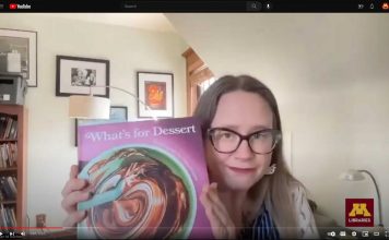Megan Kocher holding the book "What's for Dessert"