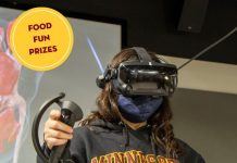 Person using VR headset and controls. Text overlay: Food, Fun, Prizes.