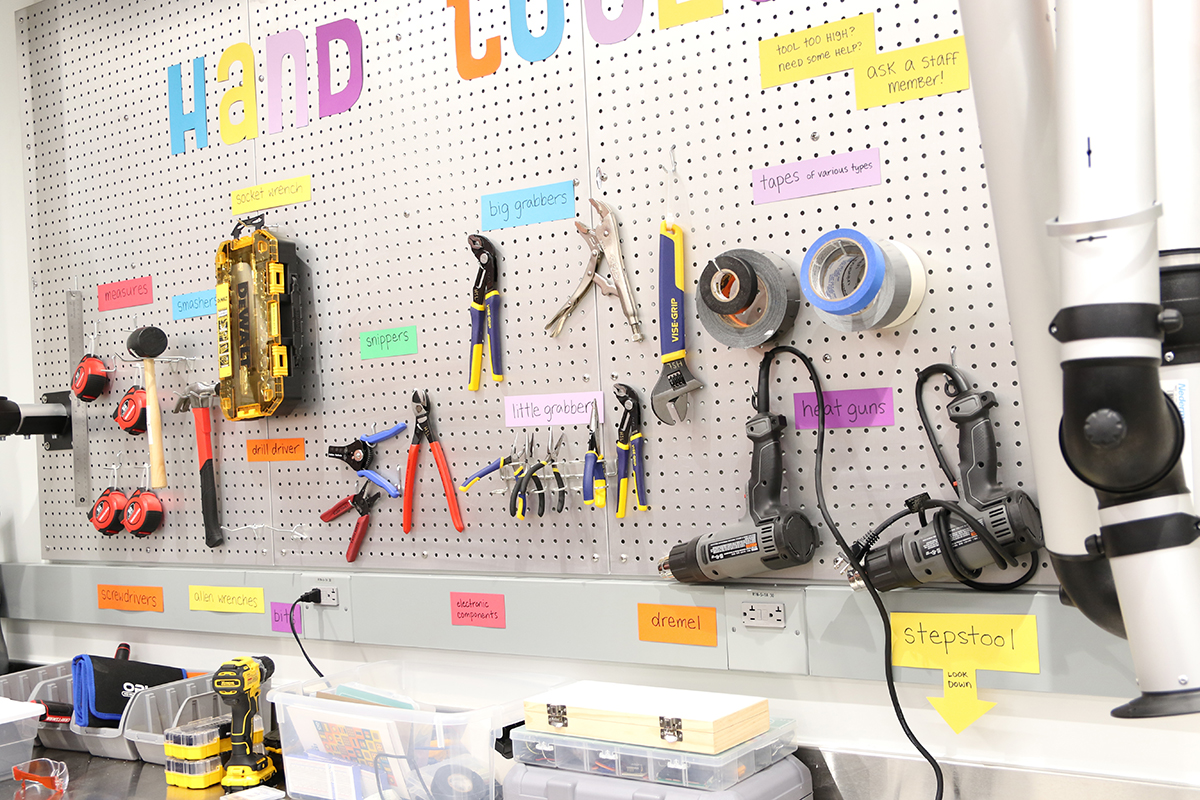 Array of tools mounted on the wall from the Heath Sciences Libraries Makerspace
