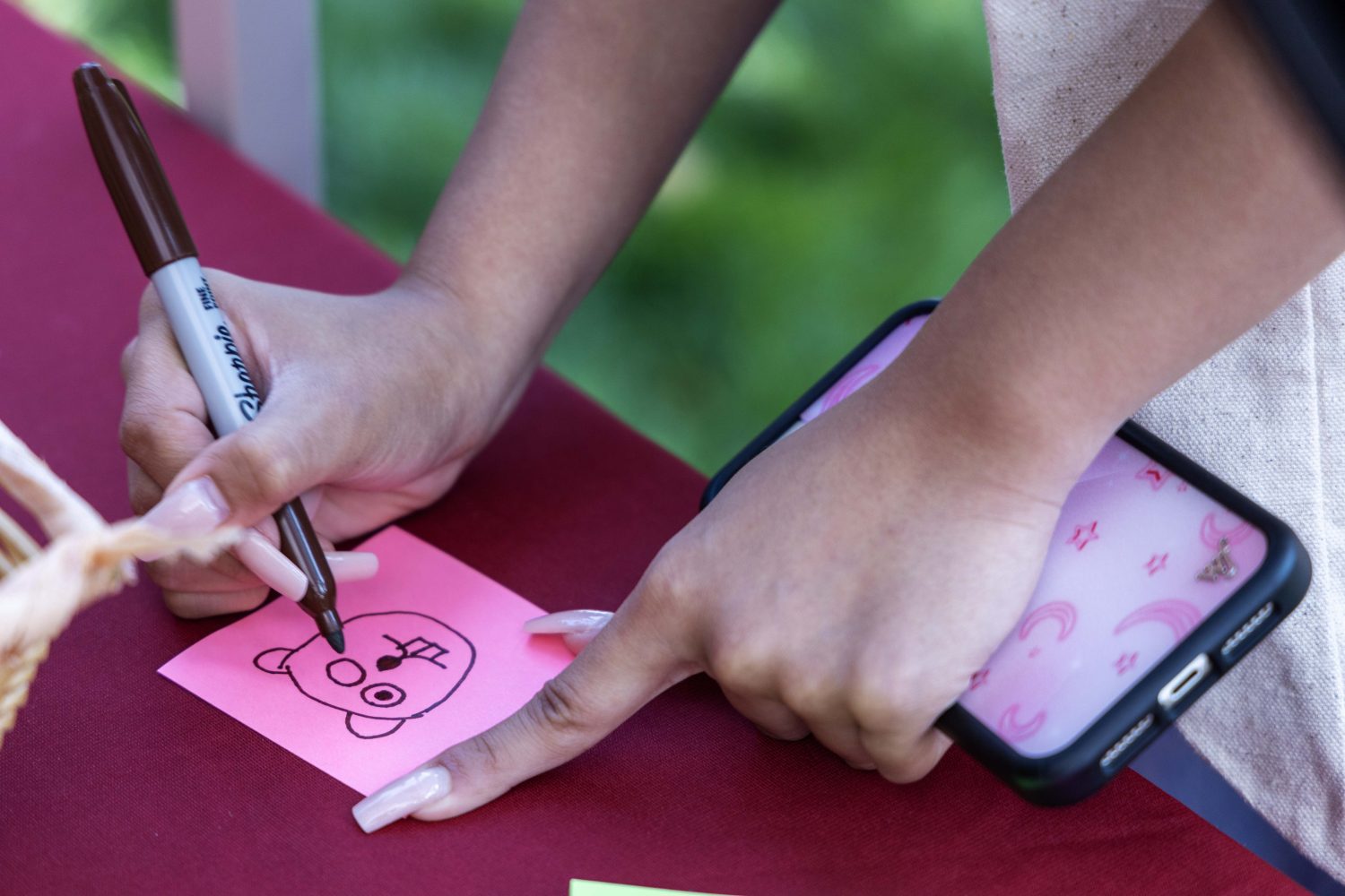Students draw pictures of gopher's for a prize during Welcome Week. (Photo/Adria Carpenter)